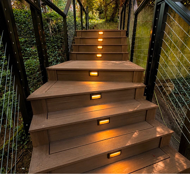 Olympic Decks Illuminated Outdoor Composite Stairs With Step Lights And Cable Railings.